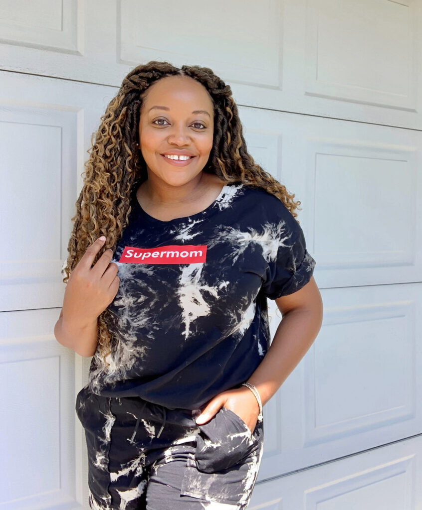 Woman smiling wearing Supermom Culture Black tie dye short set