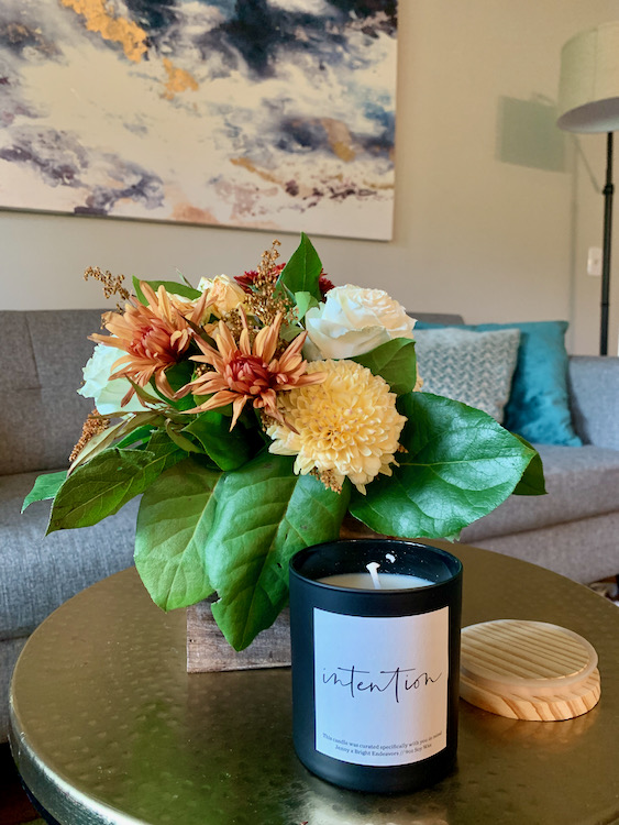 Charitable hostess gifts with Flowers for Dreams and a candle from Bright Endeavors